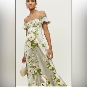 Reformation dress - worn one time to a wedding. Has been dry cleaned. Size 2.